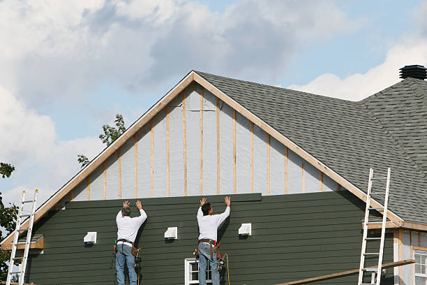 Professional Siding Replacement technician working in Carlisle, MA